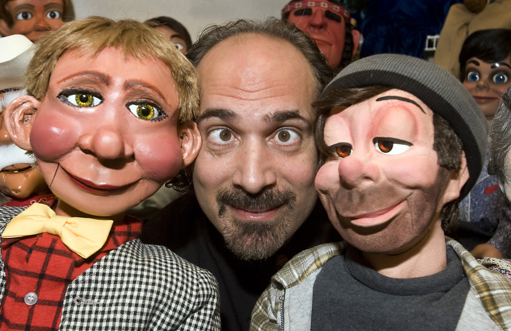 Bob Abodou, AKA "Mr Puppet", center, poses with two of his puppets at his home in Manor Friday, December 11, 2009. Abodou is Austin's only full-time ventriloquist. He regularly does shows at churchs, birthday parties and corpoarate events.....Photo by Larry Kolvoord...AUSTIN AMERICAN-STATESMAN...